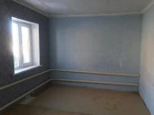 Часть жилого дома площадью 49,5 кв. м и земельный участок 300 кв. м в с. Воскресенское Саратовская области